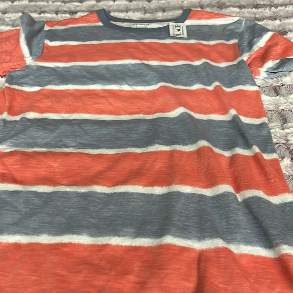 The children place t shirt size large